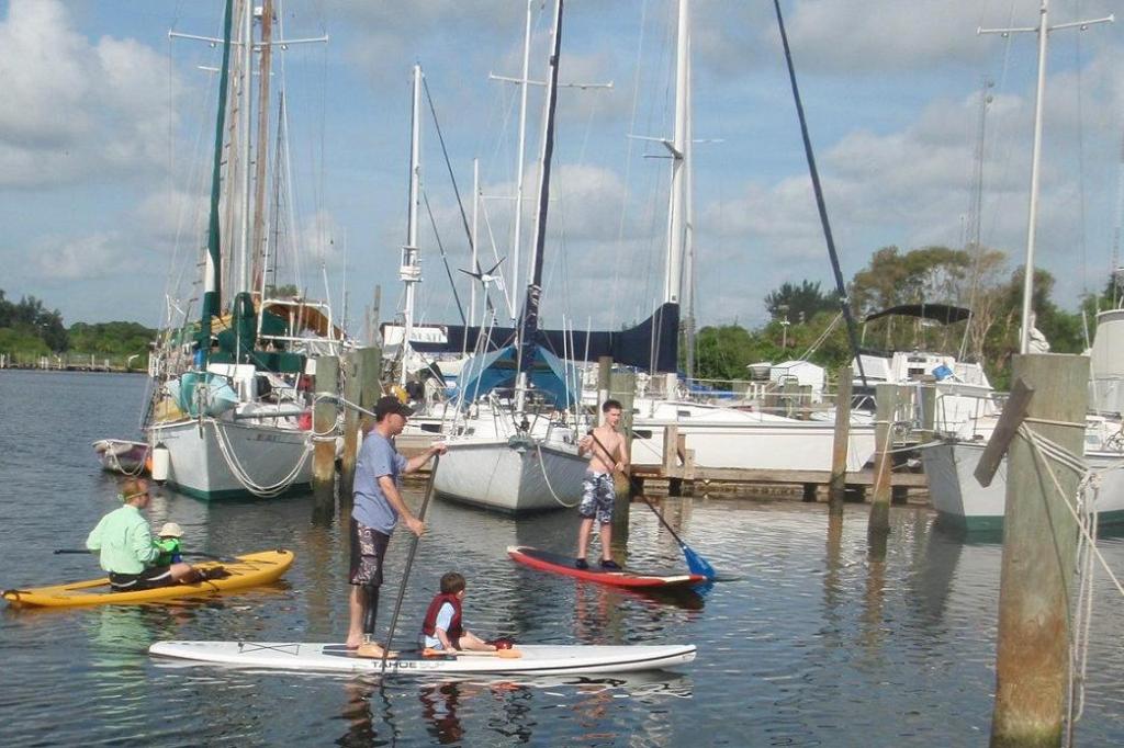 Family paddleboarding outing in August 2010, looking for manatees from the water